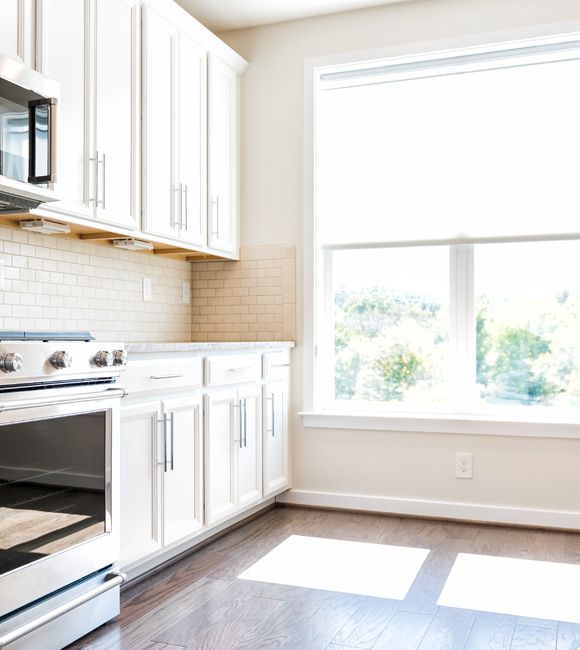 modern kitchen with natural lighting from large window
