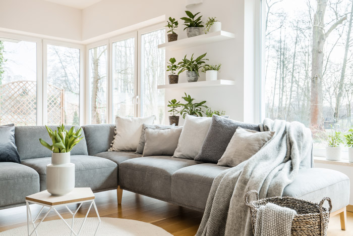 modern living room with large floor to ceiling windows